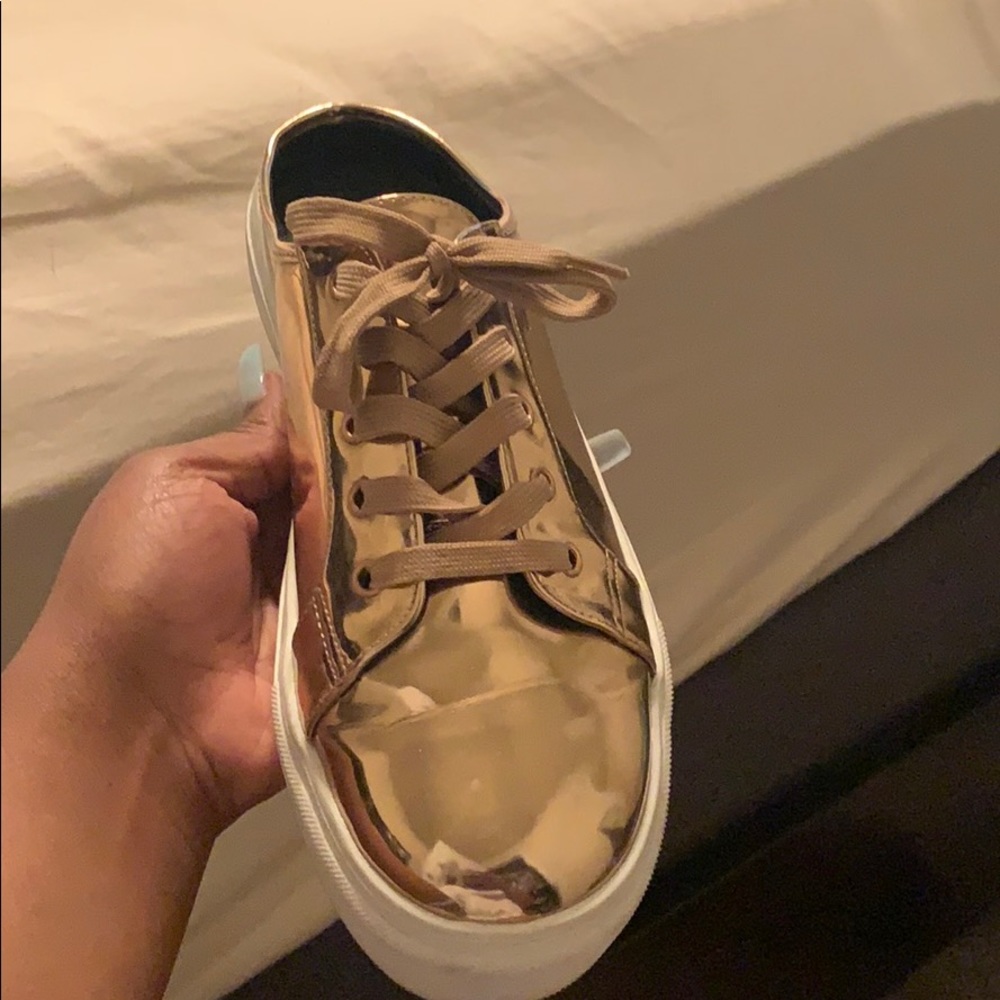 metallic gold sneakers still in good condition !